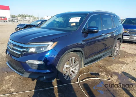 2016 Honda Pilot Touring z USA, uszkodzony, nr VIN 5FNYF5H90GB010900